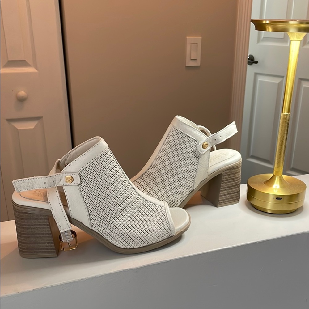 Sophisticated White and Tan Heeled Boots